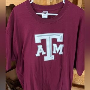 Men’s Texas A & M t-shirt, new without tags, 2 XL, maroon with white logo